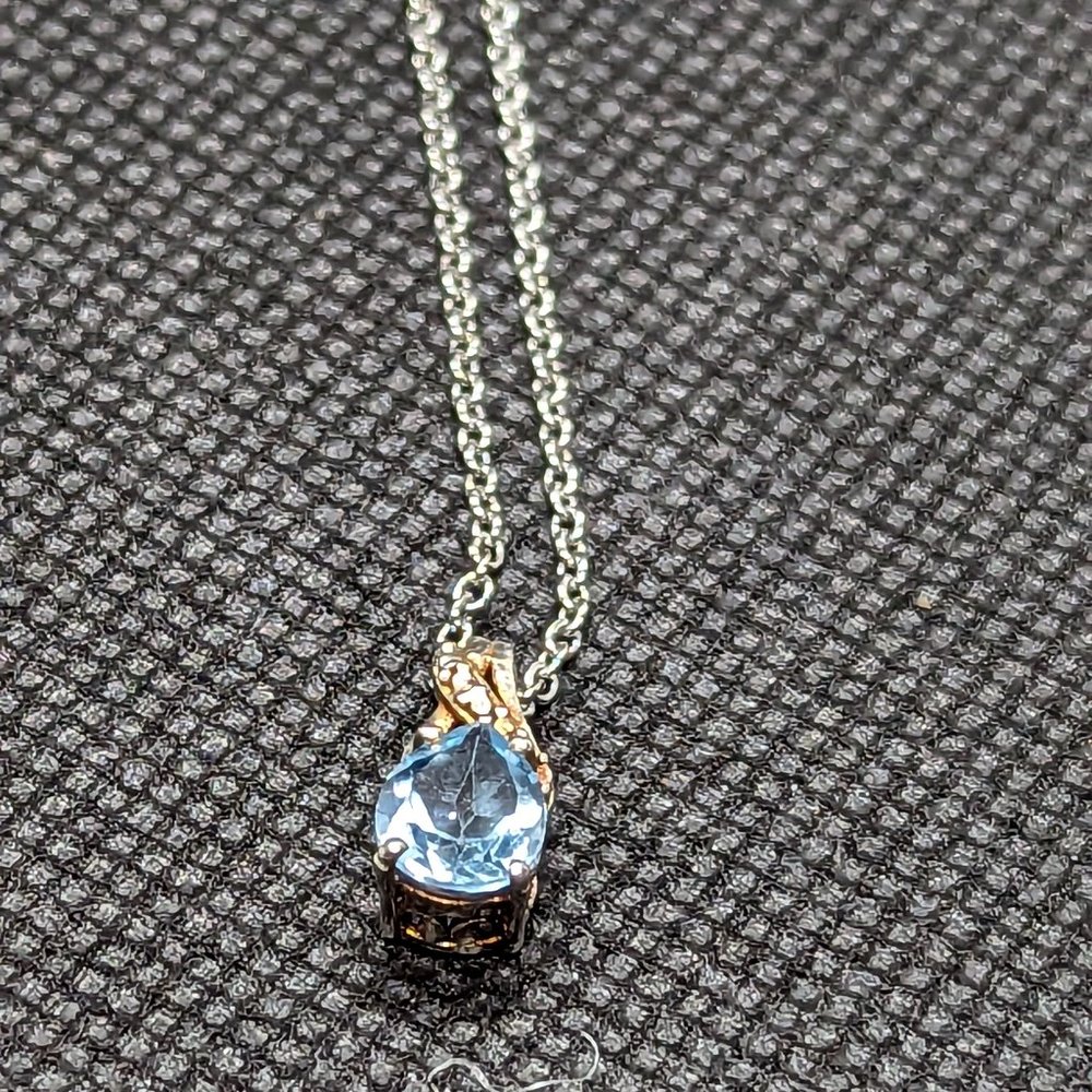 Sterling silver and sky blue topaz necklace